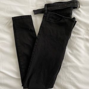 Black skinny jeans with belt attached
